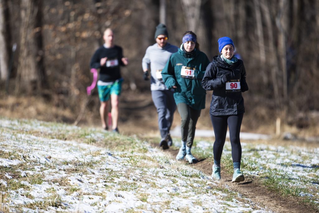 Phoebe and Julia running the 2022 Rosaryville Half Marathon & 10K produced by EX2 Adventures