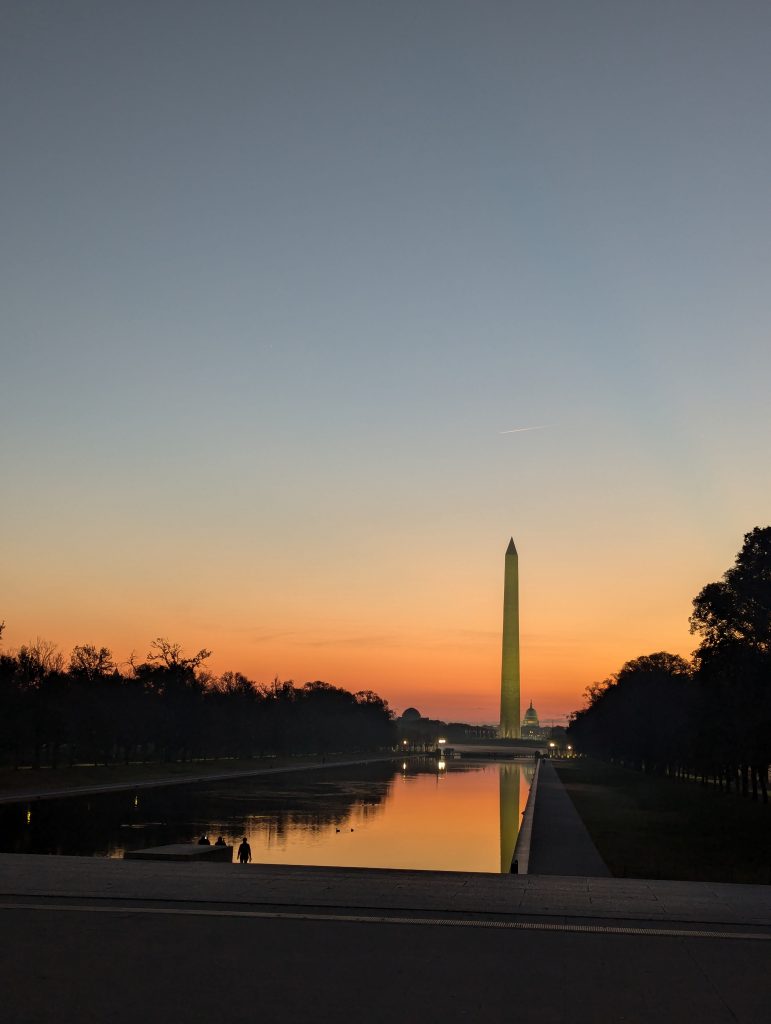 Early sunrise picture featuring the Washington Monument and the US Capitol