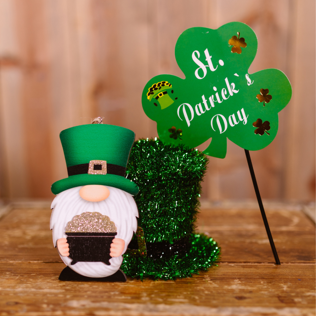 A leprechaun holds a pot of gold and is ready to Shamrock and Roll
