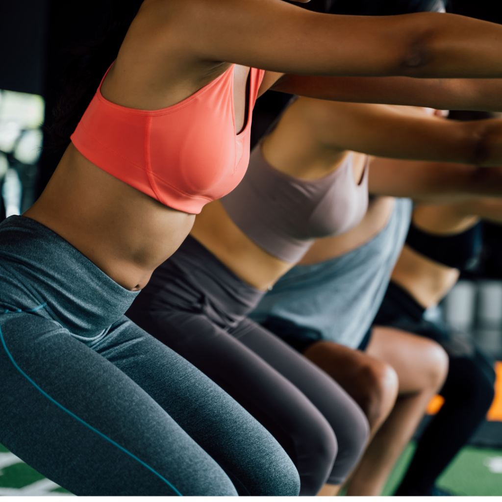 A group of people doing the Salute Your Squats workout