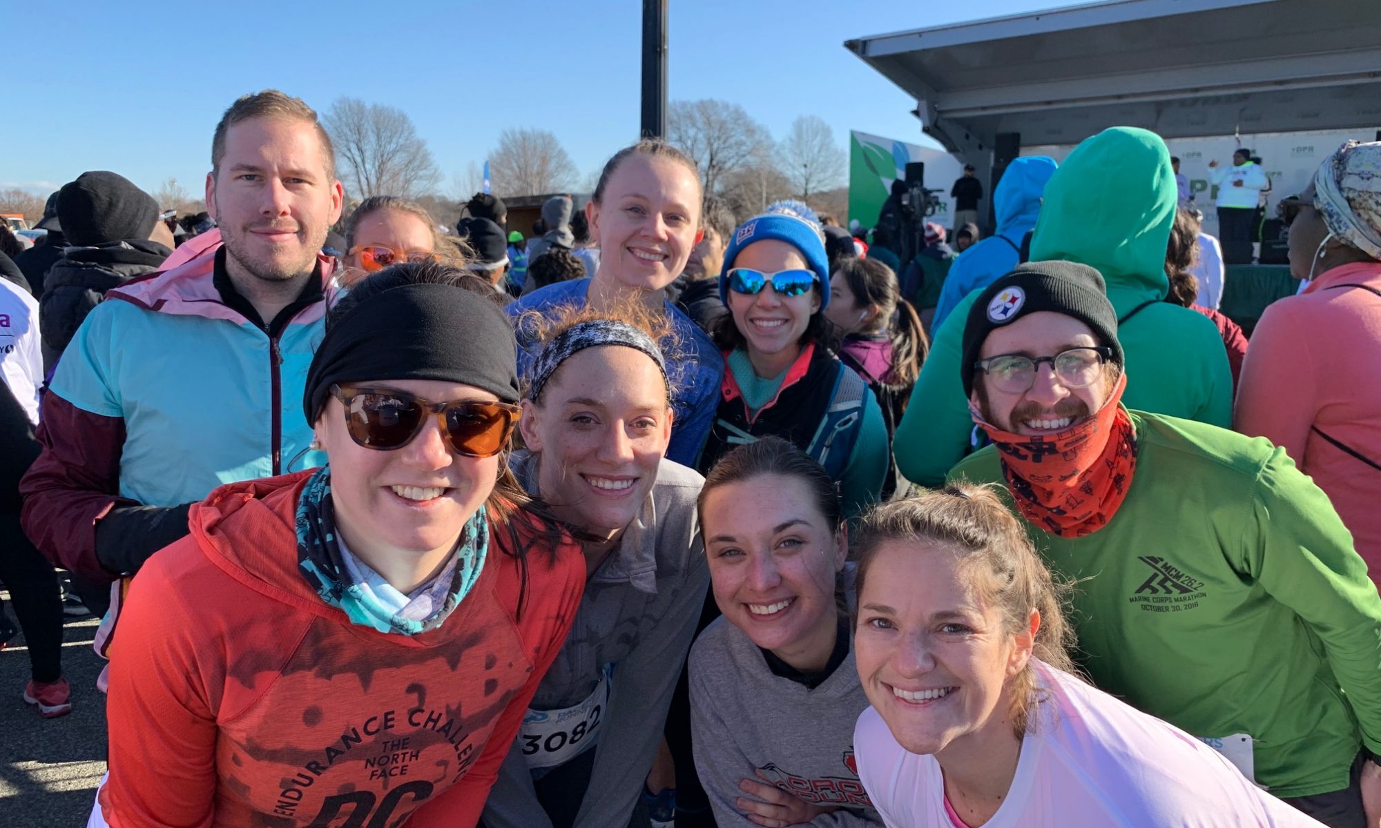 A crowd of runners with Liz